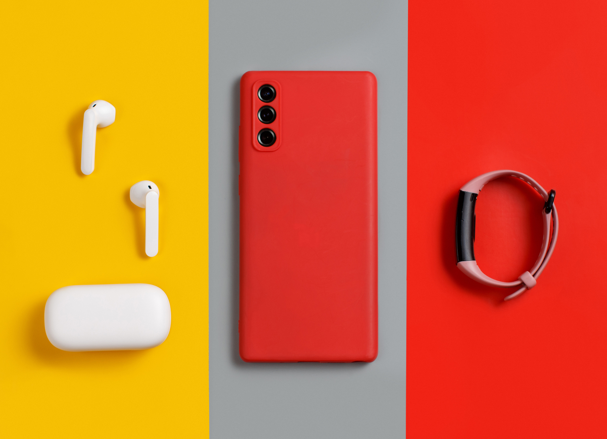 Colorful Smartphone, Earphones, and Smartwatch Flatlay
